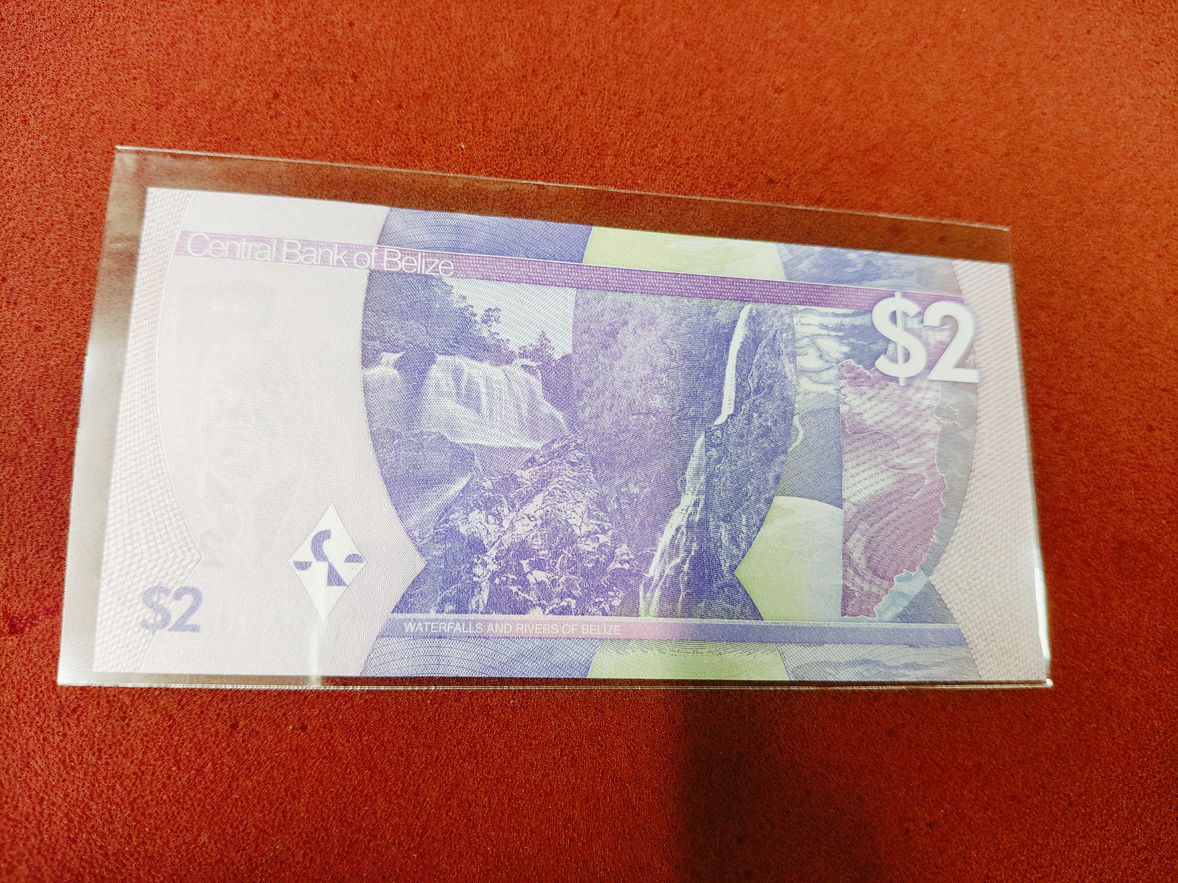 BELIZE 2 DOLLARS 2025 — photo 2 of 2