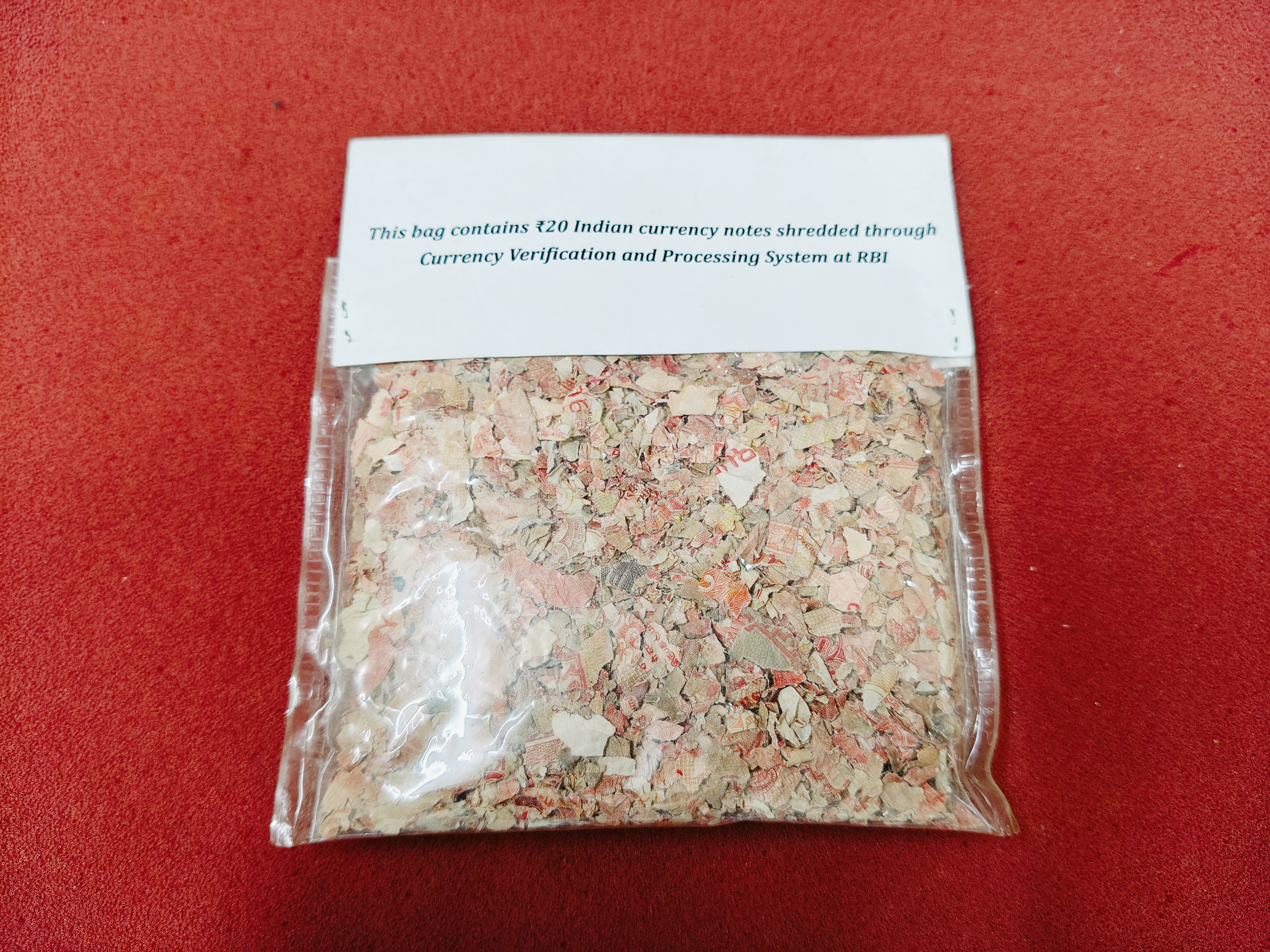 Shredded Indian currency notes, specifically ₹20 notes, processed by the Reserve Bank of India ( — photo 2 of 2